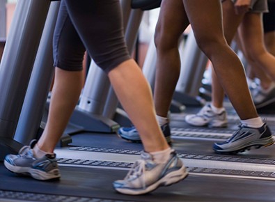 people walking on a treadmill